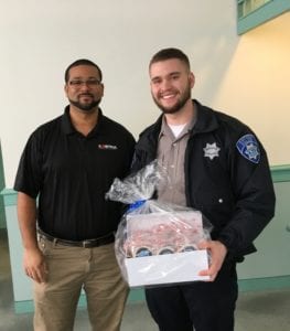 two employees with gifts