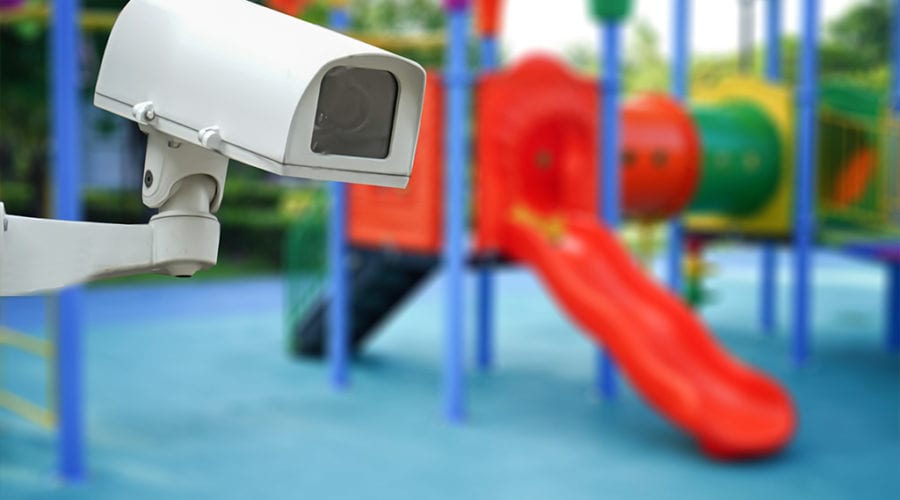 school playground with security camera